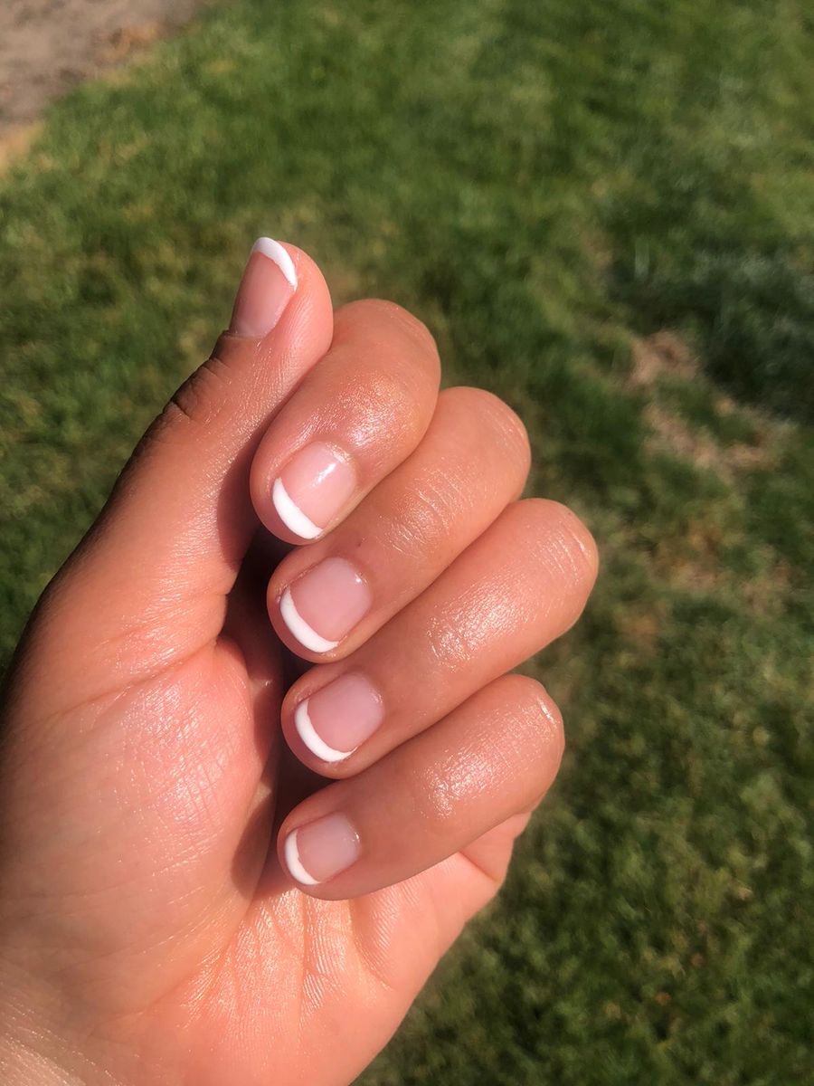Classic French-tip manicure from Nails Perfection.